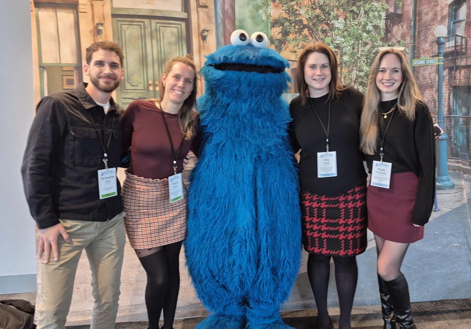 Staff pose with Cookie Monster